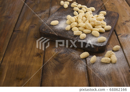 Gnocchi with potatoes. Traditional italian food from Rome, Sardinia, south of italy. Homemade Gnocchi with potatoes. Traditional italian food from Rome, Sardinia, south of italy. Homemade 68862166
