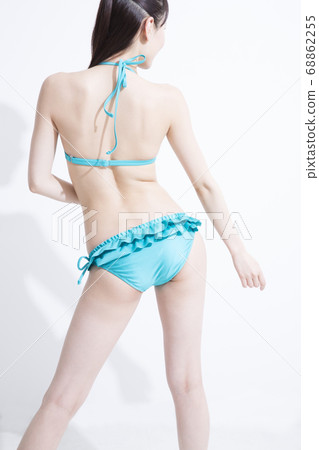 Rear view of woman in swimsuit 68862255