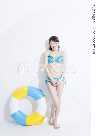 A woman in a bathing suit A woman in a bathing suit 68862272