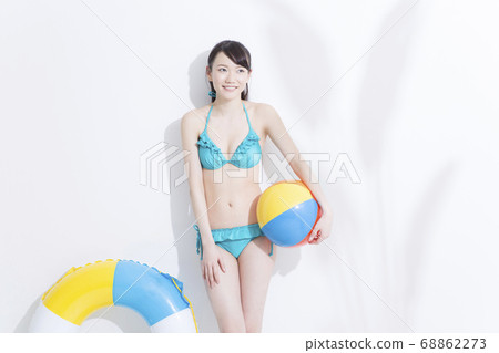 A woman in a bathing suit 68862273