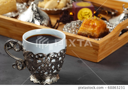 Turkish tea with oriental desserts on table 68863231