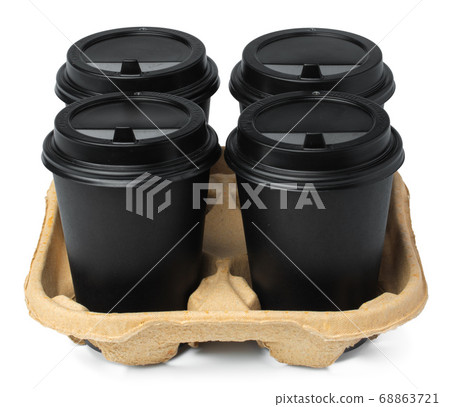 Four black takeaway cups of coffee in a tray on white background 68863721