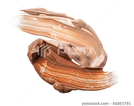 Smudged stain of a cream foundation isolated on white Smudged stain of a cream foundation isolated on white 68863791