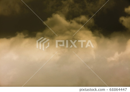High level clouds in the sky during a rain storm. High level clouds in the sky during a rain storm. 68864447