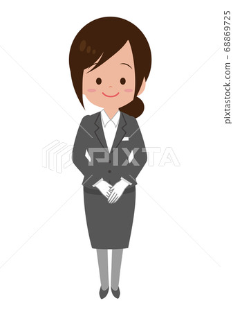 Female staff standing with hands in front 68869725