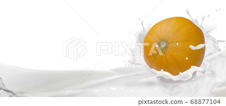 Fruit, ripe melon in a spray of yogurt. 68877104