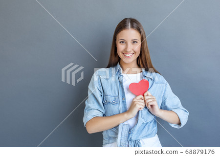 Young woman free style isolated on grey 68879176