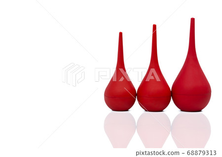 Red rubber syringe ball isolated on white 68879313
