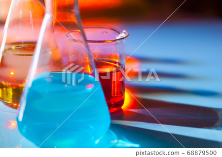 Backlit laboratory flask. Backlit laboratory flask. 68879500