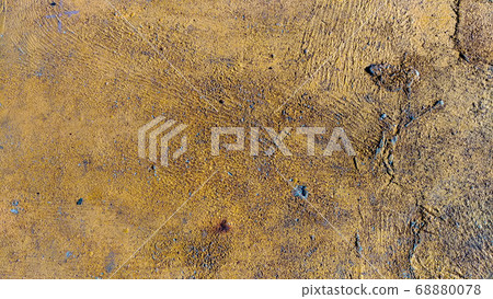 Textured rusty metal surface with yellow shades Textured rusty metal surface with yellow shades 68880078