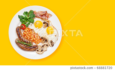 English breakfast. Fried eggs, sausages, bacon English breakfast. Fried eggs, sausages, bacon 68881720