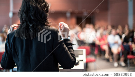 Public speaker giving talk at Business Event. 68883998