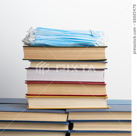 stack of various books and disposable medical stack of various books and disposable medical 68885479