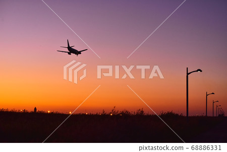 Jet airliners landing at the airport these days, when the world has turned into a daily travel ticket Jet airliners landing at the airport these days, when the world has turned into a daily travel ticket 68886331