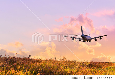 Jet airliners landing at the airport these days, when the world has turned into a daily travel ticket Jet airliners landing at the airport these days, when the world has turned into a daily travel ticket 68886337
