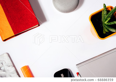 Flat lay of smart speaker with LED lights activated isolatrd on white background 68886359