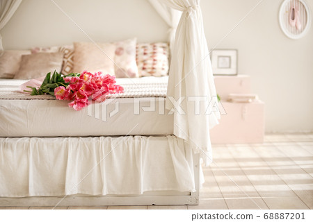 Rose bouquet. Soft focus of a Rose bouquet on a bed, romantic, honeymoon and Valentine's concept 68887201