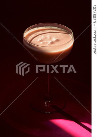 Pina Colada - Tropical Cocktail with Kahlua, Coconut Milk and Rum. Fresh Summer Drink on purple background 68887205
