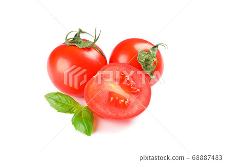 Fresh cherry tomatoes with basil isolated on white Fresh cherry tomatoes with basil isolated on white 68887483
