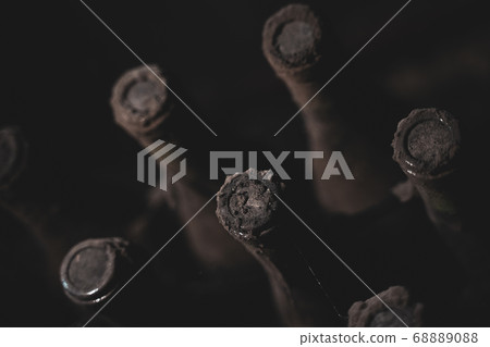 aged wine bottles covered with mold in vintage aged wine bottles covered with mold in vintage 68889088