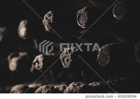 aged wine bottles covered with mold in vintage aged wine bottles covered with mold in vintage 68889094