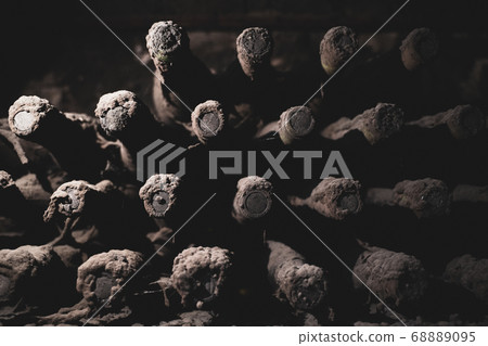 aged wine bottles covered with mold in vintage aged wine bottles covered with mold in vintage 68889095