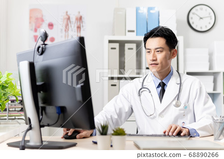 asian doctor work in clinic asian doctor work in clinic 68890266