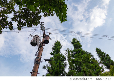 Telephone pole looking up Telephone pole looking up 68890578