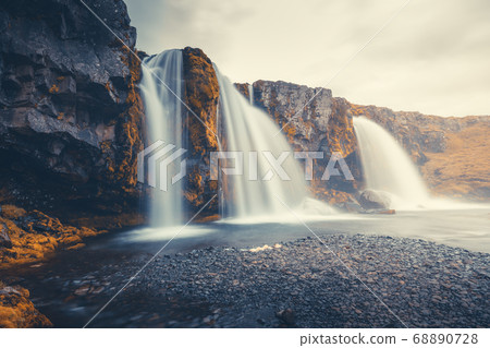 Kirkjufellsfoss Waterfall and Kirkjufell mountain Kirkjufellsfoss Waterfall and Kirkjufell mountain 68890728