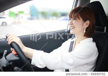Women driving Women driving 68890782
