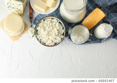 Flat lay. Different dairy products on white 68891467