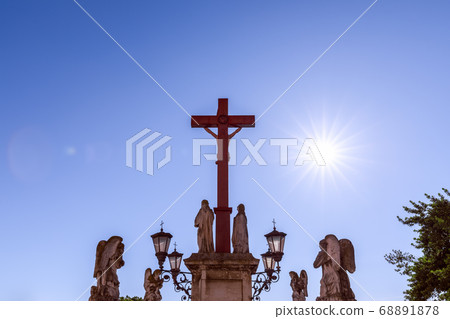 Crucifixion of Jesus in the square in front of the Cathedral of Our Lady of Doms in Avignon city Crucifixion of Jesus in the square in front of the Cathedral of Our Lady of Doms in Avignon city 68891878