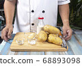 Chef and Ingredients to make mashed Potatoes 68893098