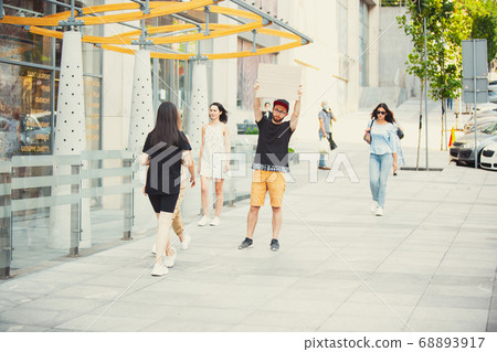 Dude with sign - man stands protesting things that annoy him 68893917