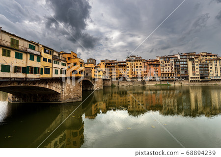 Ponte Vecchio and Arno River in Florence Tuscany Italy Ponte Vecchio and Arno River in Florence Tuscany Italy 68894239