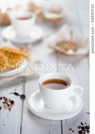 Cup of tea on table 68895010