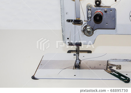Industrial sewing machine. Clothing manufacturing, Industrial sewing machine. Clothing manufacturing, 68895730