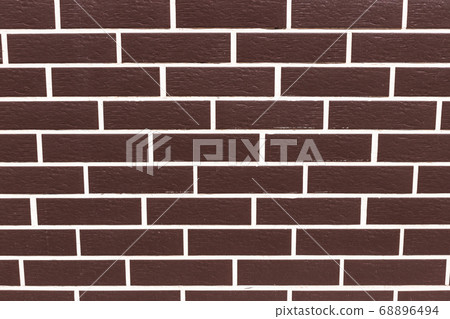 Brown smooth brick wall in a row. Close-up Brown smooth brick wall in a row. Close-up 68896494