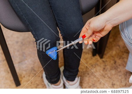 Woman child neurologist examines the girl in the Woman child neurologist examines the girl in the 68897525