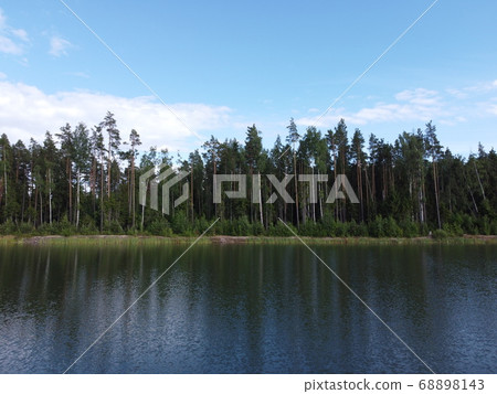 woodland on the shore of a reservoir on a summer day aerial photo woodland on the shore of a reservoir on a summer day aerial photo 68898143