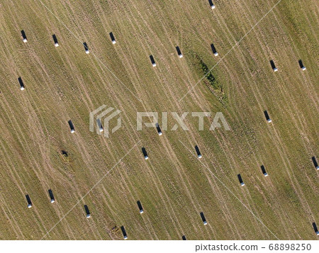 rolls of hay on the field aerial photo rolls of hay on the field aerial photo 68898250