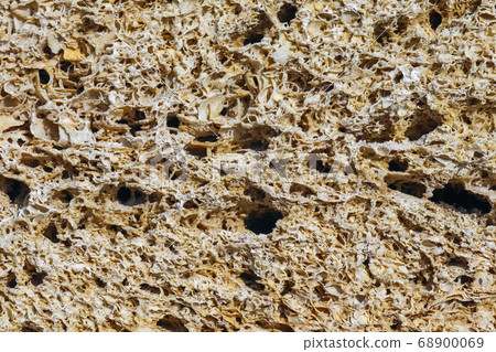 masonry wall paving stones as a background close up 68900069
