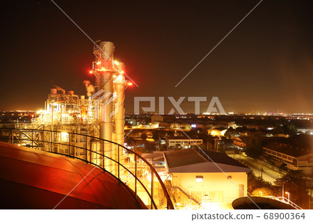 The lights of the power plant and the city at night 68900364