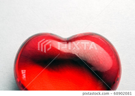 glass heart on a white background isolate 68902081