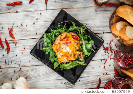 Julienne under the cheese with arugula Julienne under the cheese with arugula 68907969