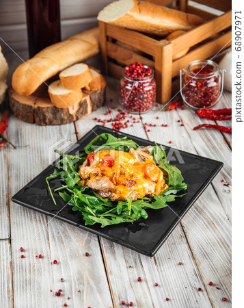 Julienne under the cheese with arugula Julienne under the cheese with arugula 68907971
