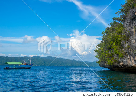Green Rock in Indonesia and Pleasure Boats Green Rock in Indonesia and Pleasure Boats 68908120