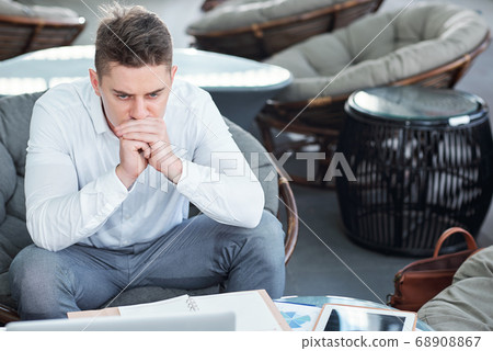 Pensive serious entrepreneur 68908867