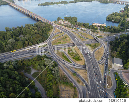 Cars ride on the road. Kyiv. Ukraine. Aerial Cars ride on the road. Kyiv. Ukraine. Aerial 68910326