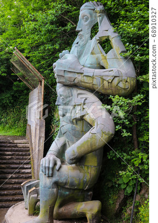 Waterfall and monument of St. Andrew near Sarpi 68910327